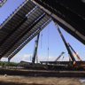 Lifting pivot up roof grids.